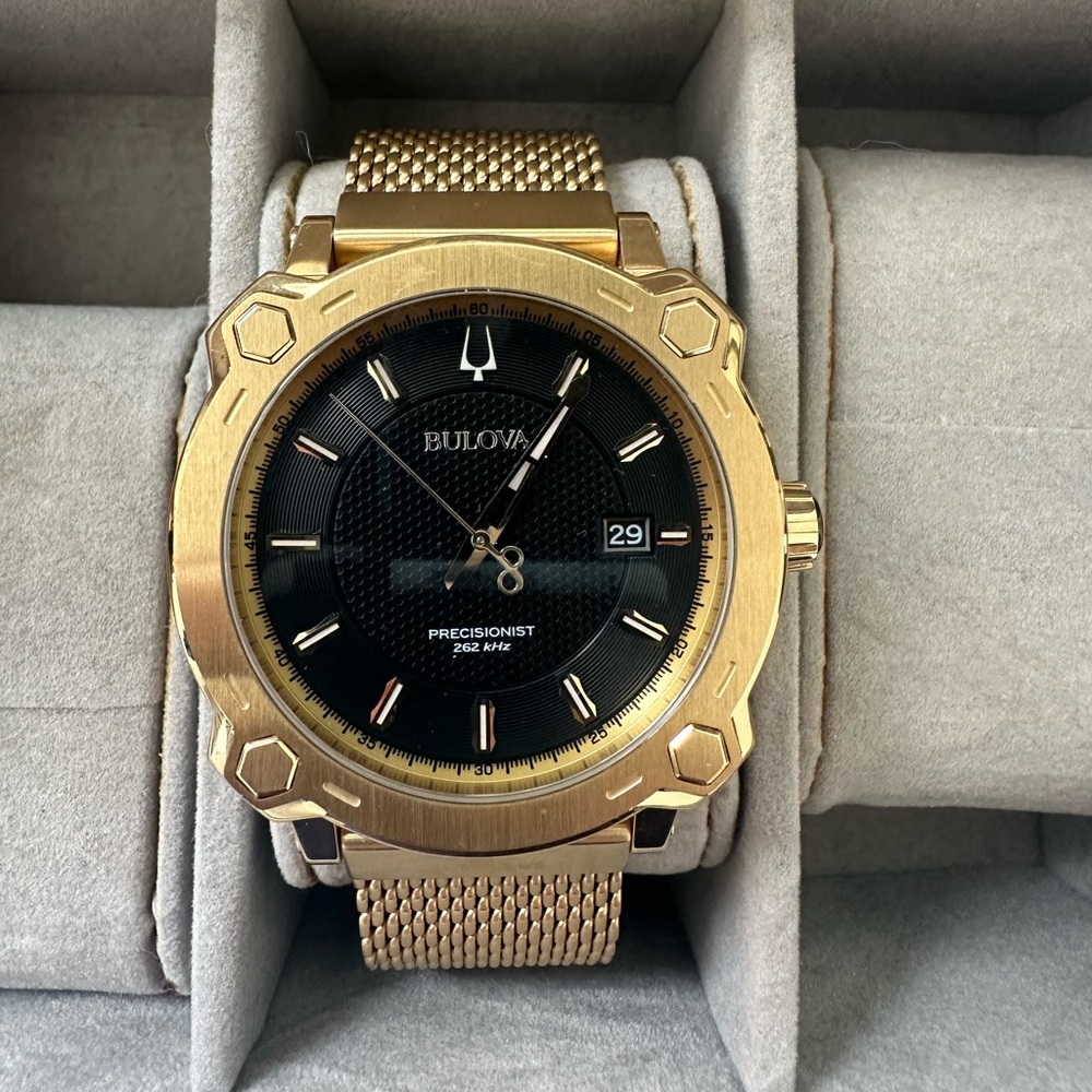Men's gold Bulova Precisionist watch